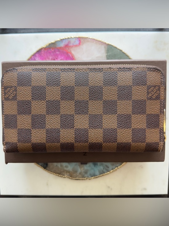 Louis Vuitton Handbags - NEW Authentic Louis Vuitton Damier Ebene Brown Zippy Wallet